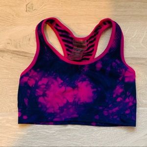 worn tie dye colored climawear sports bra